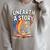 Women's Unearth A Story Rainbow Treasure Book Summer Reading 2026 Raglan Sleeve Sweatshirt Heather Forest Women's Unearth A Story Rainbow Treasure Book Summer Reading 2026 Raglan Sleeve Sweatshirt Heather Forest