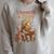 Women's Unearth a Story Triceratops Dinosaur Reading Books Dino Raglan Sleeve Sweatshirt Heather Forest Women's Unearth a Story Triceratops Dinosaur Reading Books Dino Raglan Sleeve Sweatshirt Heather Forest