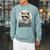 Booktrovert Raccoon Reading And Coffee For Book Lover Raglan Sleeve Sweatshirt Cardinal