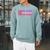 The Good Guys Don't Ban Books Reading Raglan Sleeve Sweatshirt Cardinal