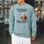 Never Underestimate A Woman Who Still Reads Books In Her Raglan Sleeve Sweatshirt Cardinal