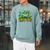 Unearth a Story Library Summer Reading 2026 Dinosaur Book Raglan Sleeve Sweatshirt Cardinal