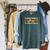To Ban A Book Is To Fear Its Magic Men Women Raglan Sleeve Sweatshirt Heather Blue Lagoon