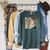 Feminist Ruth Bader Ginsburg RBG Quote Girl With Book Women Premium Tri-Blend Raglan Sleeve Sweatshirt Heather Blue Lagoon