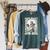 Leave Reality Enter Books Skeleton Reading Book Raglan Sleeve Sweatshirt Heather Blue Lagoon