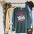 Smutty Book Merch Good Girls Read Dirty Books Smut Readers Raglan Sleeve Sweatshirt Heather Blue Lagoon