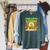 Unearth A Story Dinosaur Summer Reading 2026 Books Raglan Sleeve Sweatshirt Heather Blue Lagoon