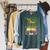 Unearth A Story T Rex Reading Book Floral Summer Reading Raglan Sleeve Sweatshirt Heather Blue Lagoon Unearth A Story T Rex Reading Book Floral Summer Reading Raglan Sleeve Sweatshirt Heather Blue Lagoon