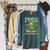 Women's Book Sea Turtle Summer Reading 2026 Unearth a Story Raglan Sleeve Sweatshirt Heather Blue Lagoon