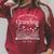 The Best Chapter Yet Grandma Est 2026 Book Lover Floral Raglan Sleeve Sweatshirt Heather Dust