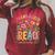 Plant A Seed Read Library Summer Reading 2026 Floral Book Raglan Sleeve Sweatshirt Heather Dust Plant A Seed Read Library Summer Reading 2026 Floral Book Raglan Sleeve Sweatshirt Heather Dust
