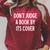 Sarcastic Don't Judge A Book By It's Cover Joke Raglan Sleeve Sweatshirt Heather Dust