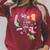 Unearth a Story Dinosaur Book 2026 Summer Reading Program Raglan Sleeve Sweatshirt Heather Dust Unearth a Story Dinosaur Book 2026 Summer Reading Program Raglan Sleeve Sweatshirt Heather Dust