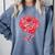 Sporty Rose Graphic With Baseball And Rugby Ball Petals Comfort Colors Sweatshirt Denim Sporty Rose Graphic With Baseball And Rugby Ball Petals Comfort Colors Sweatshirt Denim