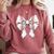 Baseball Mom Coquette Bow Mother's Day Baseball Mom Tees Comfort Colors Sweatshirt Orchid Baseball Mom Coquette Bow Mother's Day Baseball Mom Tees Comfort Colors Sweatshirt Orchid
