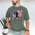 Women's Batter Patriotic American Flag Baseball Silks Men's Comfort Colors T-Shirt Moss Women's Batter Patriotic American Flag Baseball Silks Men's Comfort Colors T-Shirt Moss