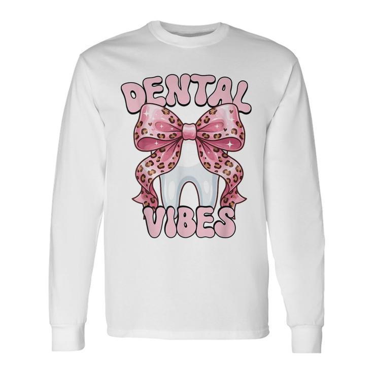 Dentalibes 歯 ピンク ヒョウ柄 弓 歯科医 長袖Tシャツ