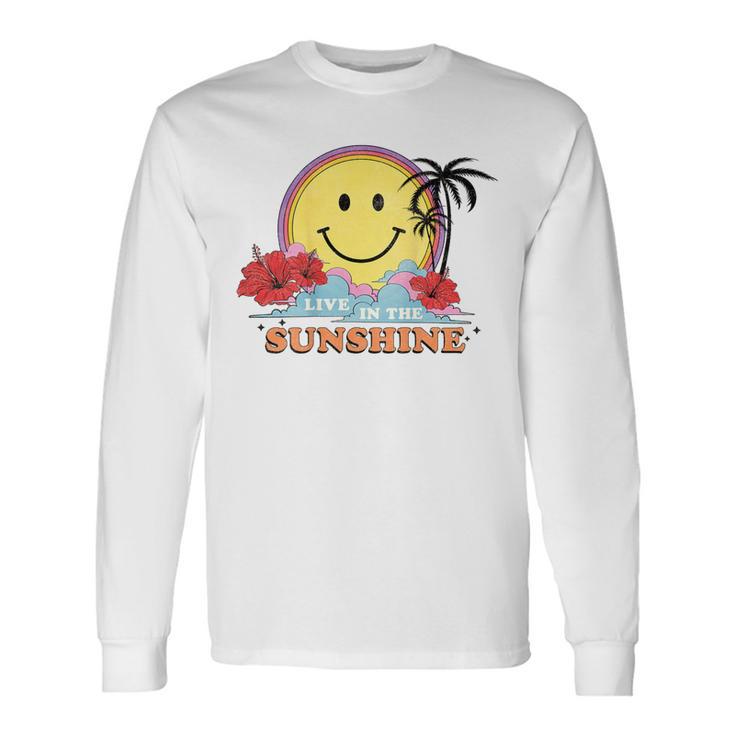レトロなハッピーフェイス ハイビスカス ヤシの木「太陽に生きる」ビーチ 長袖Tシャツ