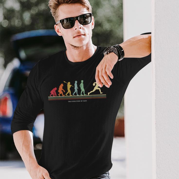 The Evolution Of Man アメリカンフットボール選手 長袖Tシャツ 彼への贈り物