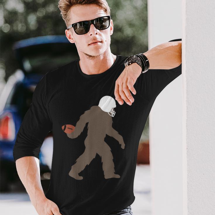ビッグフット アメフト おもしろい サスカッチ アメリカンフットボール 長袖Tシャツ 彼への贈り物