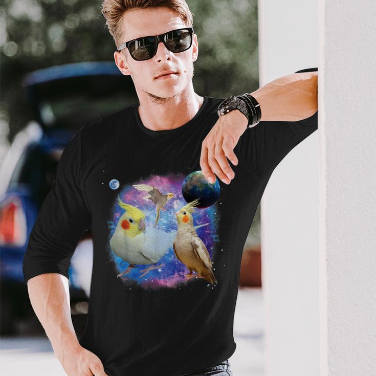 銀河を飛んでいる面白いオカメインコ オカメインコ 長袖Tシャツ 彼への贈り物