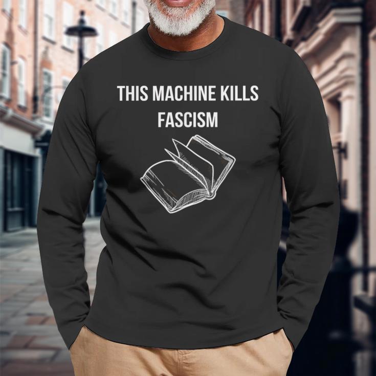 This Machine Kills Fascism 本読書 反トランプ 長袖Tシャツ 高齢者への贈り物