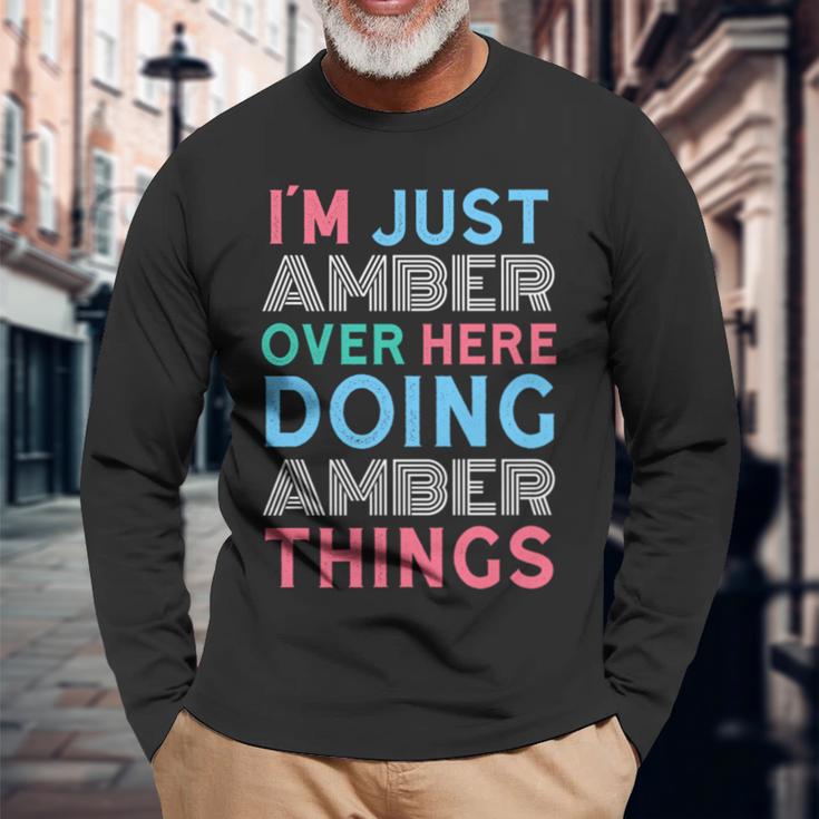 俺はこっちのアンバーなんだよこいつはアンバー・シングス・ネームをやってるだけ 長袖tシャツ 長袖Tシャツ 高齢者への贈り物