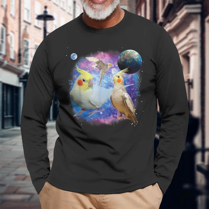 銀河を飛んでいる面白いオカメインコ オカメインコ 長袖Tシャツ 高齢者への贈り物