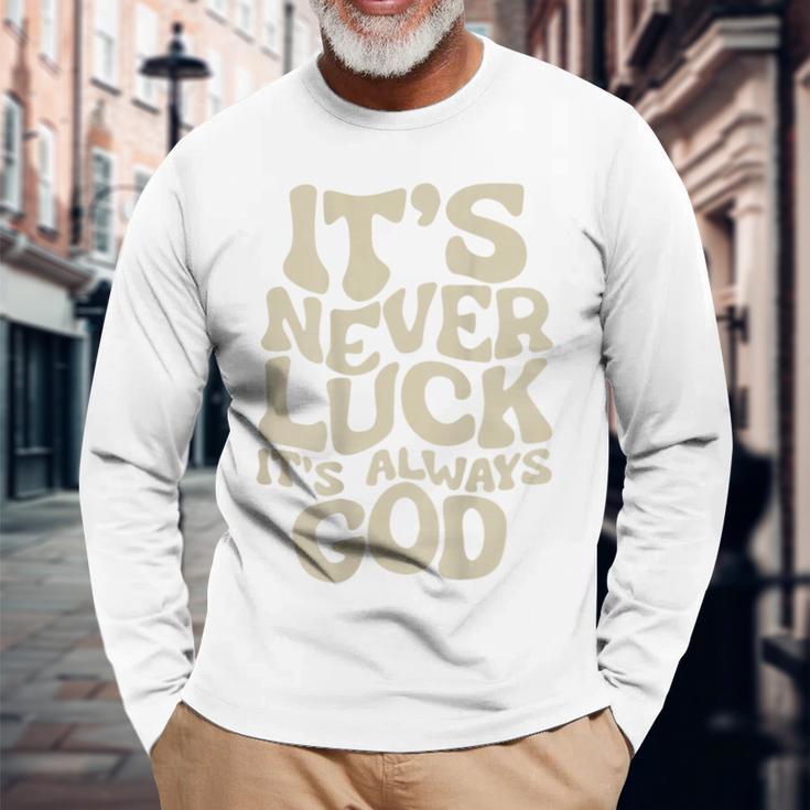 それは決して運ではない、それは常に神だ 長袖Tシャツ 高齢者への贈り物