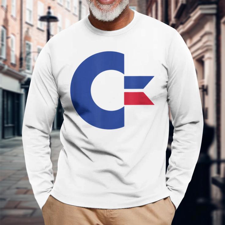 コモドール C64 大文字 ブルーレッド 長袖Tシャツ 高齢者への贈り物