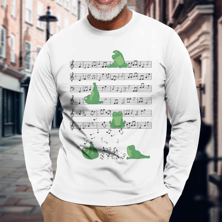 ヨガをしているかわいいカエル 音符 音記号 ミュージシャンアート 長袖tシャツ 長袖Tシャツ 高齢者への贈り物