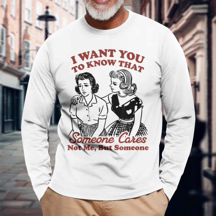 誰かが私ではなく誰かを気にかけていることを知ってほしい 長袖Tシャツ 高齢者への贈り物