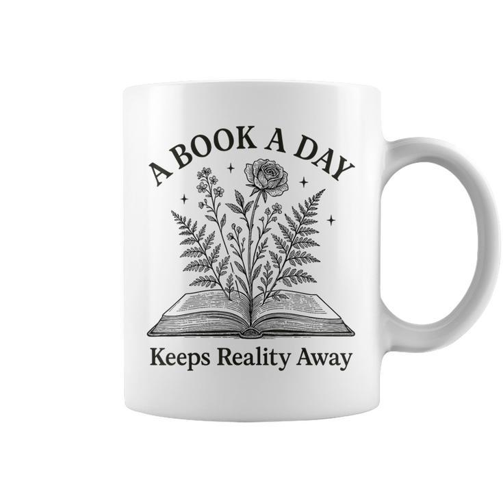 A Book A Day Keeps Reality Away Floral Reader Graphic Print Coffee Mug