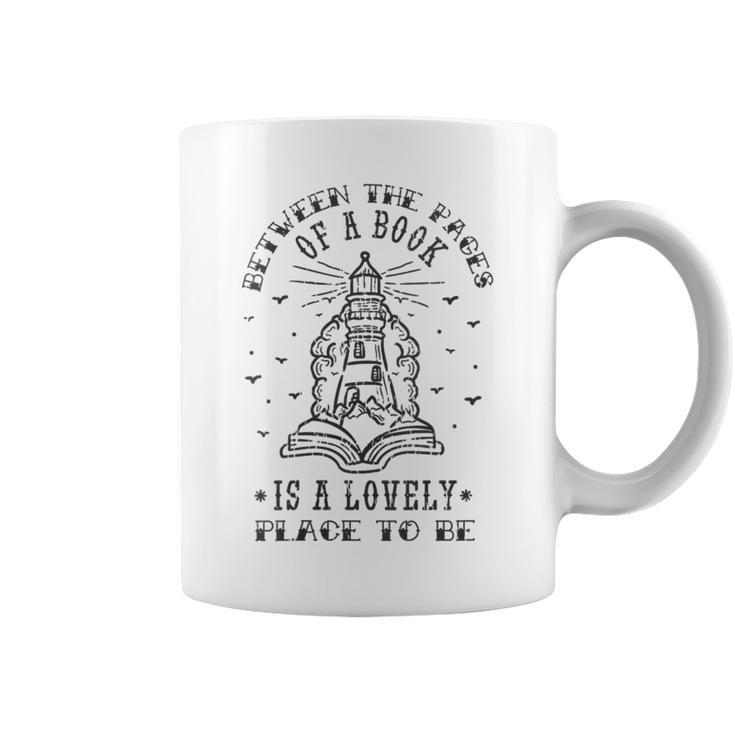 BETWEEN THE PAGES OF A BOOK IS A LOVELY PLACE TO BE Meme Graphic Print Coffee Mug