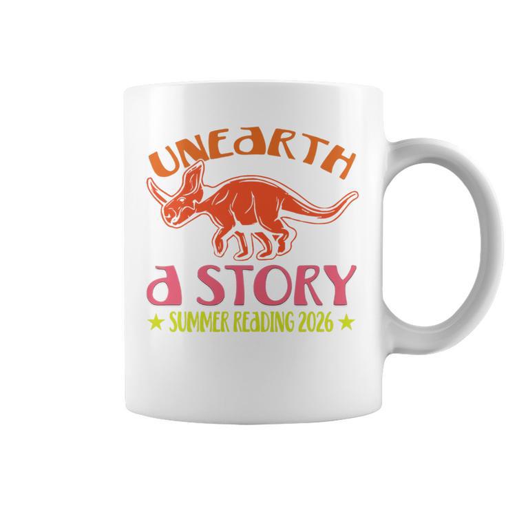 Unearth a Story Summer Reading 2026 Triceratops Dino Book Premium Tri-Blend Graphic Print Coffee Mug Unearth a Story Summer Reading 2026 Triceratops Dino Book Premium Tri-Blend Graphic Print Coffee Mug