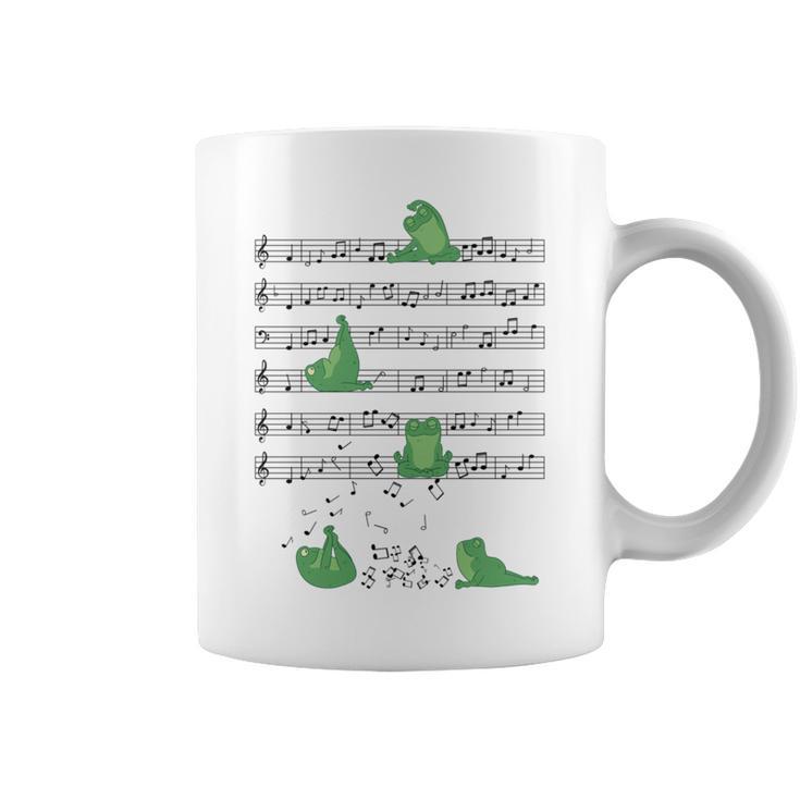 ヨガをしているかわいいカエル 音符 音記号 ミュージシャンアート 長袖tシャツ コーヒーマグ