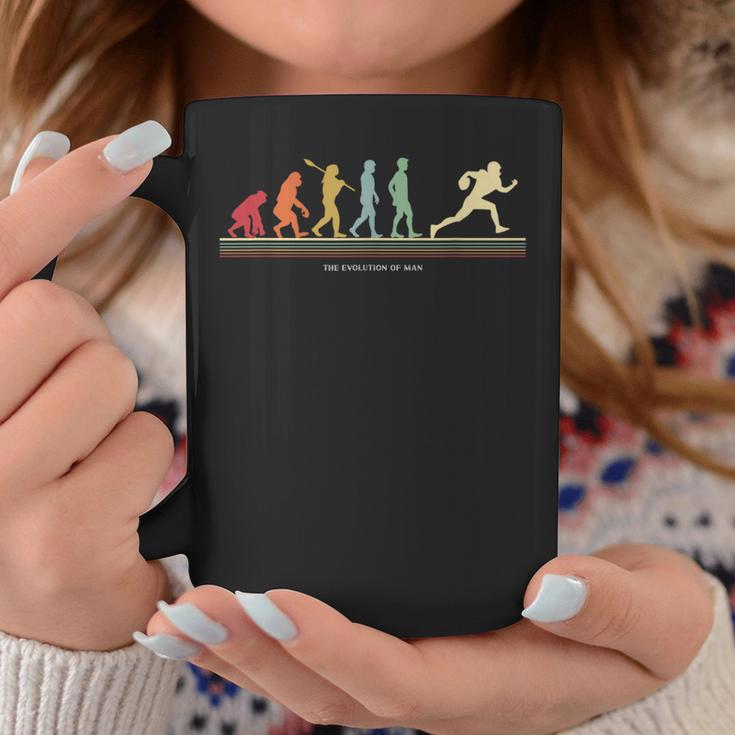 The Evolution Of Man アメリカンフットボール選手 コーヒーマグ 面白い贈り物