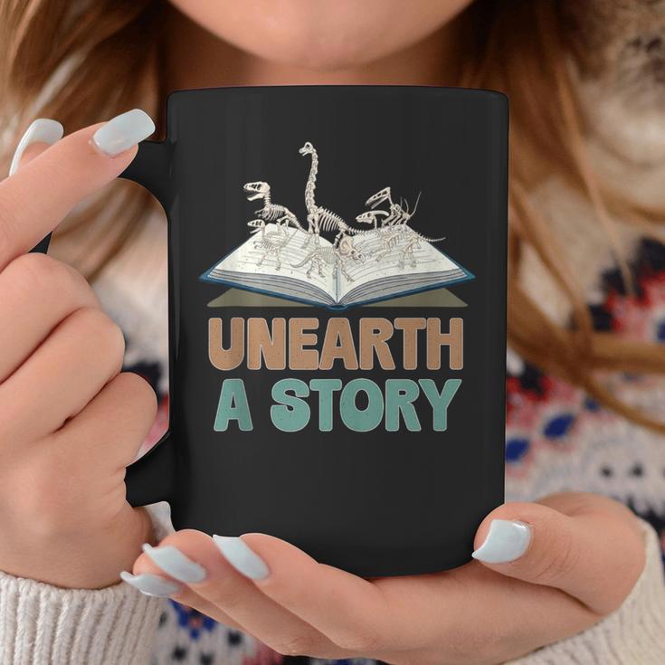 Unearth A Story Skeleton Dinosaur Book Summer Reading 2026 Graphic Print Coffee Mug Unique Gifts Unearth A Story Skeleton Dinosaur Book Summer Reading 2026 Graphic Print Coffee Mug Unique Gifts