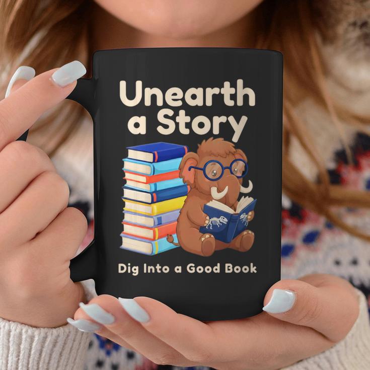 Women's Unearth A Story Reading Mammoth Prehistoric Book Librarian Graphic Print Coffee Mug Unique Gifts
