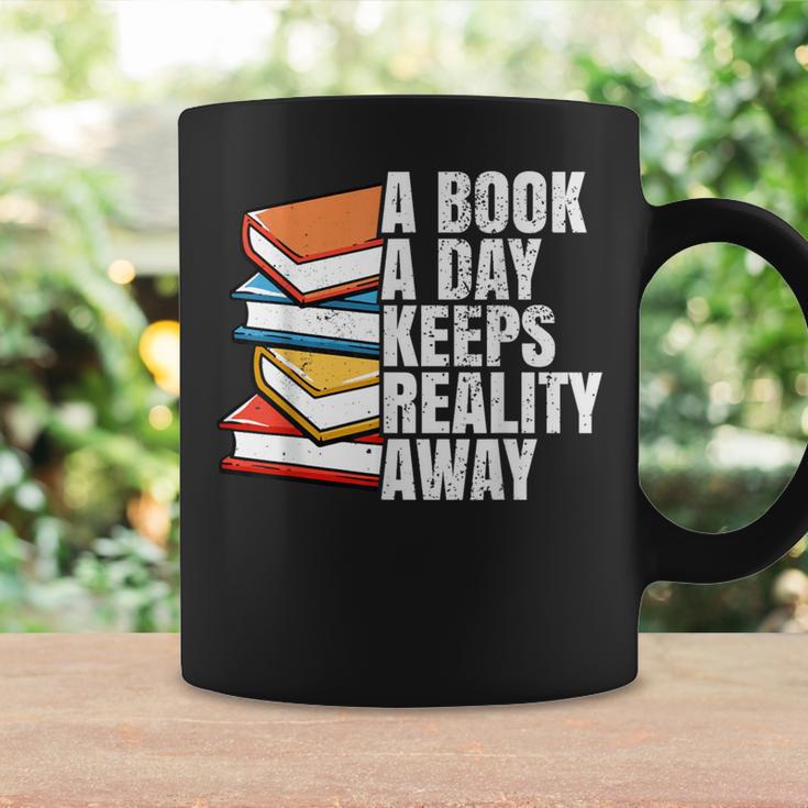 A Book A Day Keeps Reality Away Bookworm Graphic Print Coffee Mug Gifts ideas