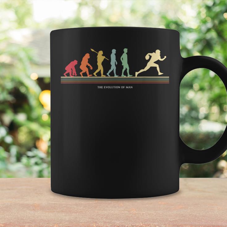 The Evolution Of Man アメリカンフットボール選手 コーヒーマグ ギフトのアイデア