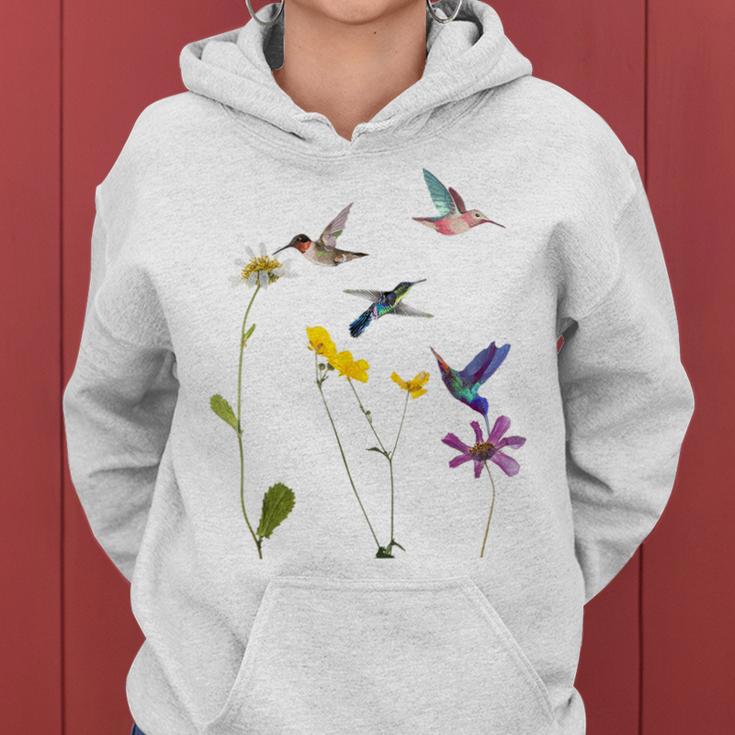 ハチドリと花のtシャツ レディースパーカー
