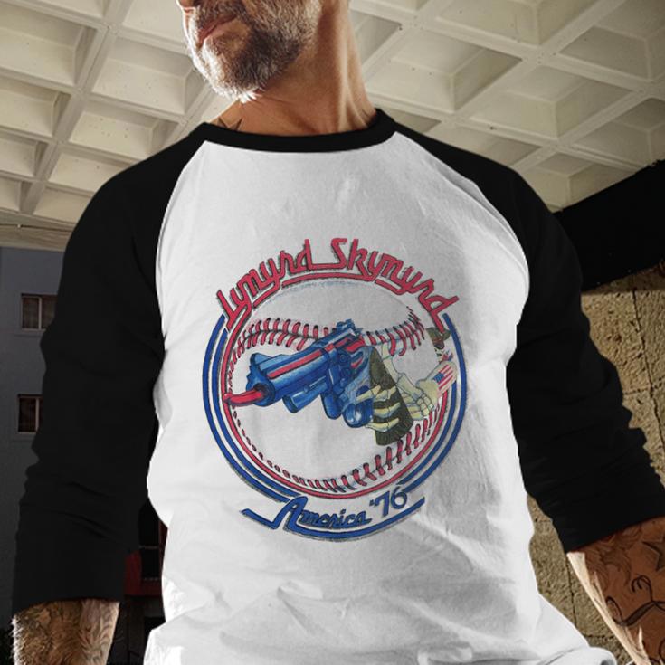 Lynyrd Skynyrd Skeleton Baseball Gun US Flag Cowboy Rock Fan Baseball Raglan Shirt Lynyrd Skynyrd Skeleton Baseball Gun US Flag Cowboy Rock Fan Baseball Raglan Shirt