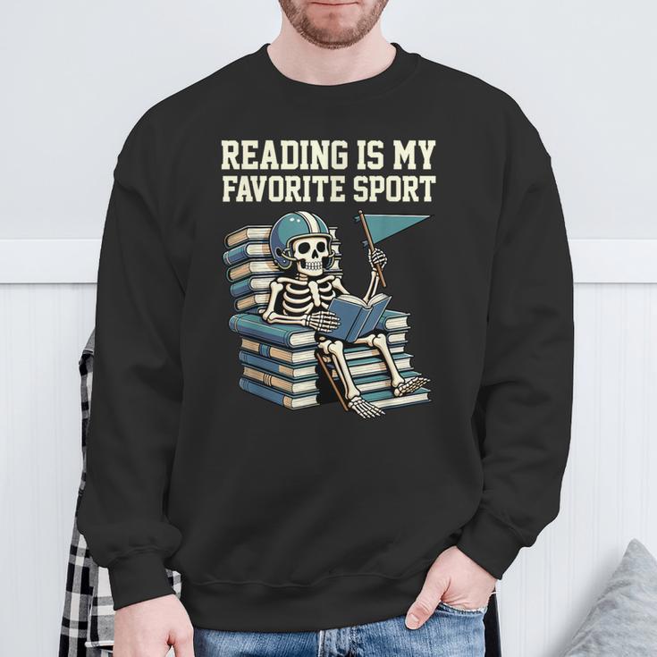 Football Skeleton Reading On Book Stack Sweatshirt Gifts for Old Men