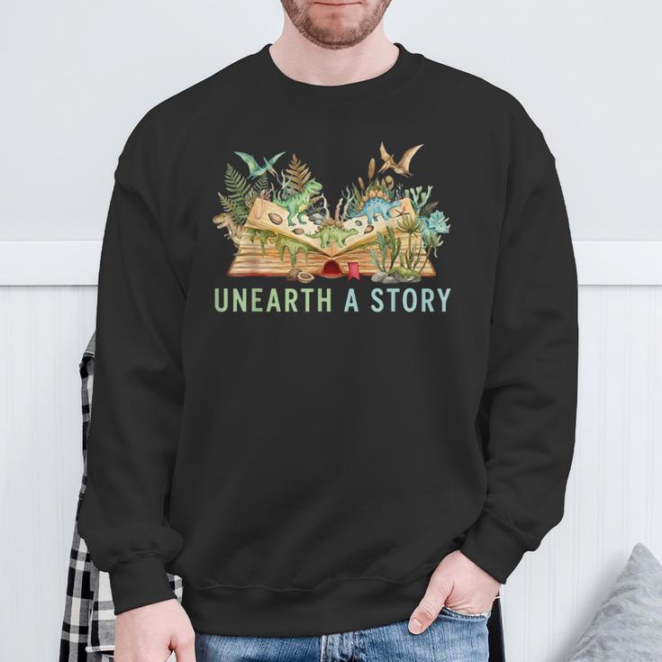 Unearth a Story Dinosaur 2026 Summer Reading Program Book Sweatshirt Gifts for Old Men Unearth a Story Dinosaur 2026 Summer Reading Program Book Sweatshirt Gifts for Old Men