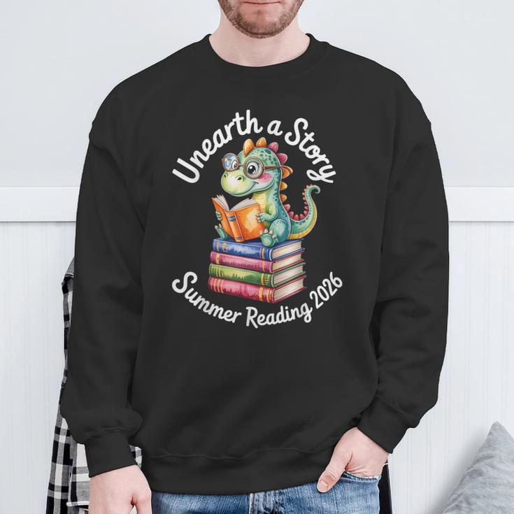 Unearth a Story Summer Reading 2026 Book Lover Dino Fun Sweatshirt Gifts for Old Men Unearth a Story Summer Reading 2026 Book Lover Dino Fun Sweatshirt Gifts for Old Men