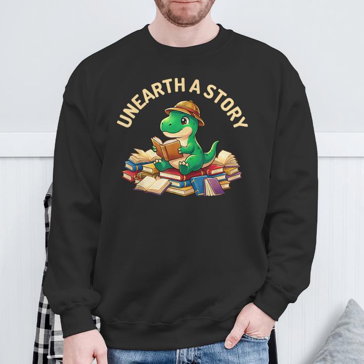 Unearth A Story Summer Reading 2026 Dinosaur Book Floral Sweatshirt Gifts for Old Men Unearth A Story Summer Reading 2026 Dinosaur Book Floral Sweatshirt Gifts for Old Men