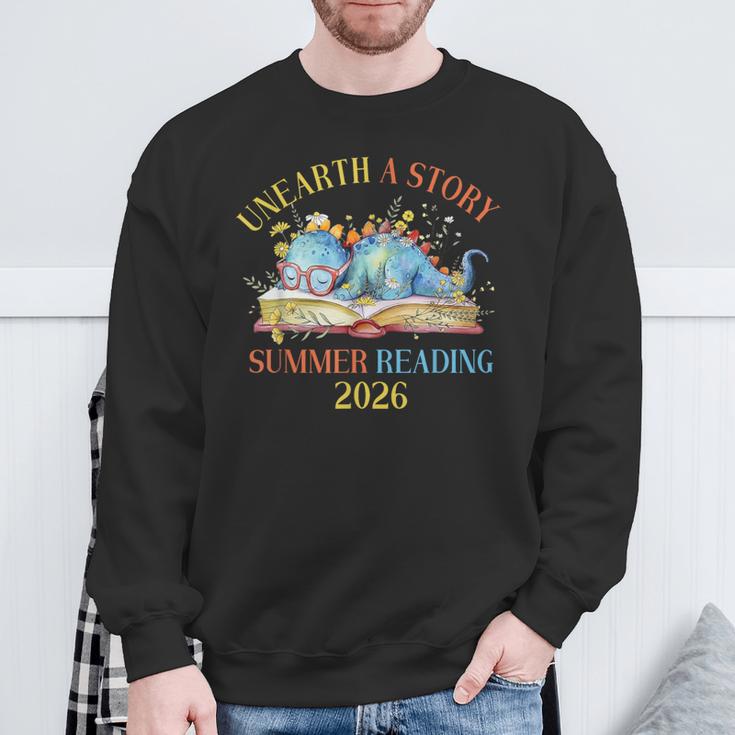 Unearth a Story Summer Reading 2026 Dinosaur Books Dino Sweatshirt Gifts for Old Men Unearth a Story Summer Reading 2026 Dinosaur Books Dino Sweatshirt Gifts for Old Men