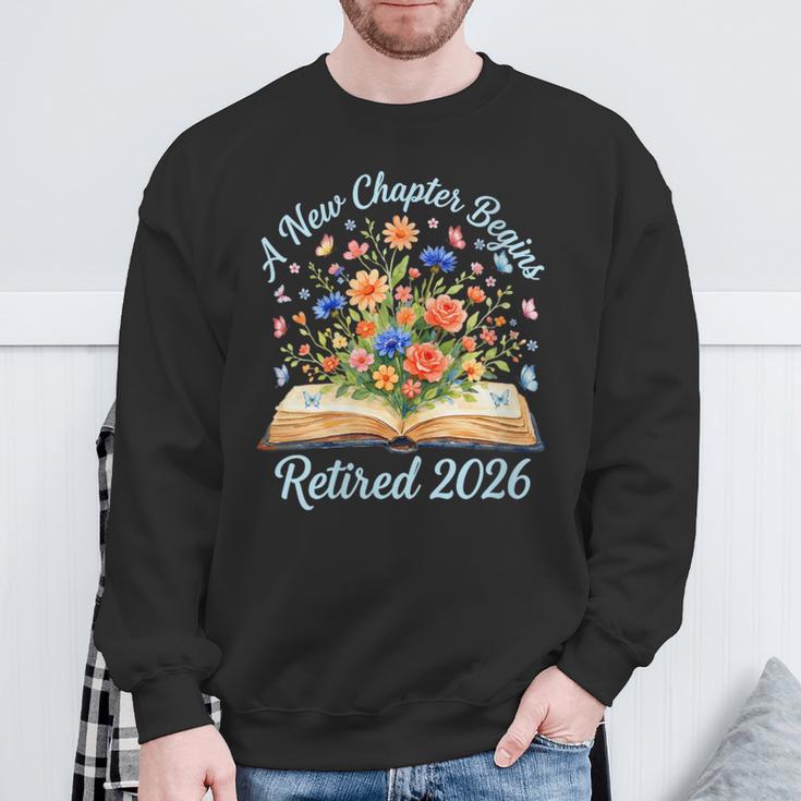 Women's New Chapter Begins Retired 2026 Watercolor Floral Book Women Sweatshirt Gifts for Old Men