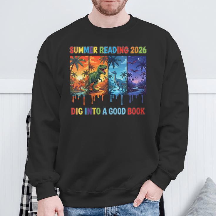 Women's Summer Reading 2026 Unearth A Story Dinosaur Books Sweatshirt Gifts for Old Men
